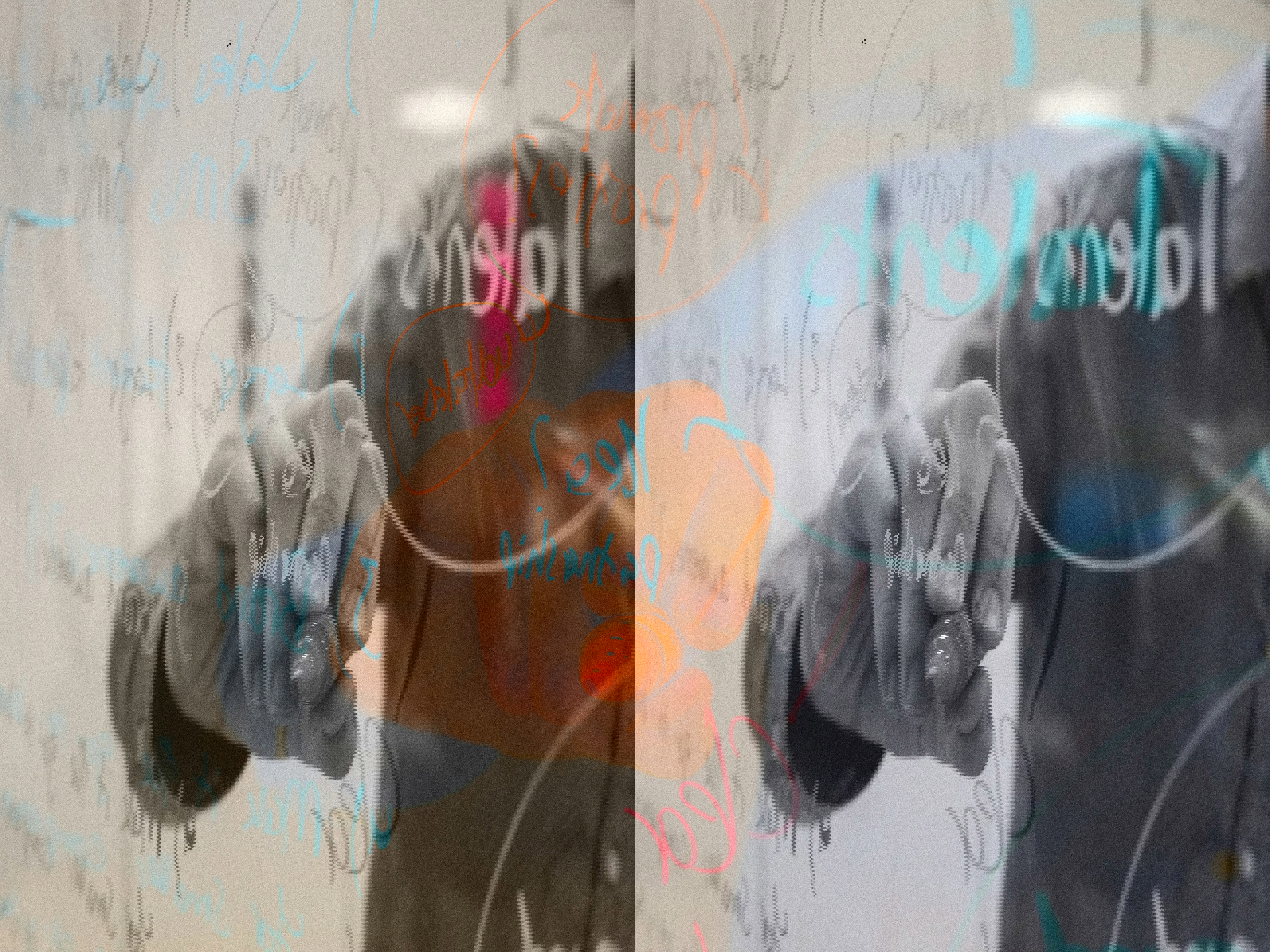 hand writing on see through whiteboard